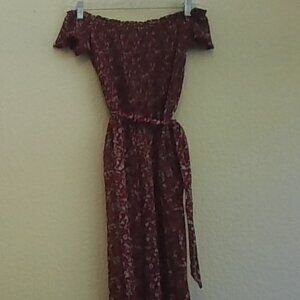 Off the shoulder red floral patterned jumpsuit